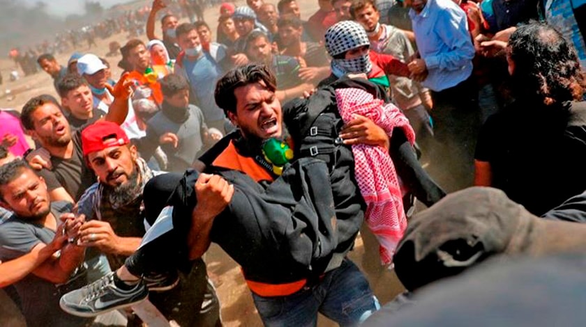 Всего пострадавших в ходе столкновений палестинских протестующих и израильских военных около трех тысяч undefined