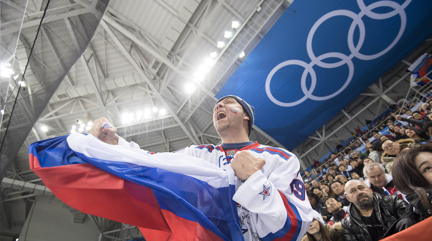 Кристоф Вишеманн заявил, что международная организация серьезно нарушила процессуальные права российских атлетов Болельщик с российским флагом. Зимние Олимпийские игры 2018, Южная Корея